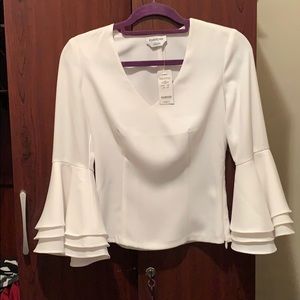 White fancy BEBE shirt size 0